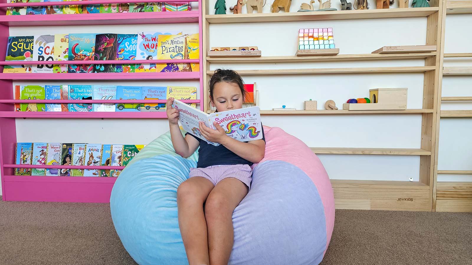 A round Cloud Pod bean bag chair on a light-coloured floor